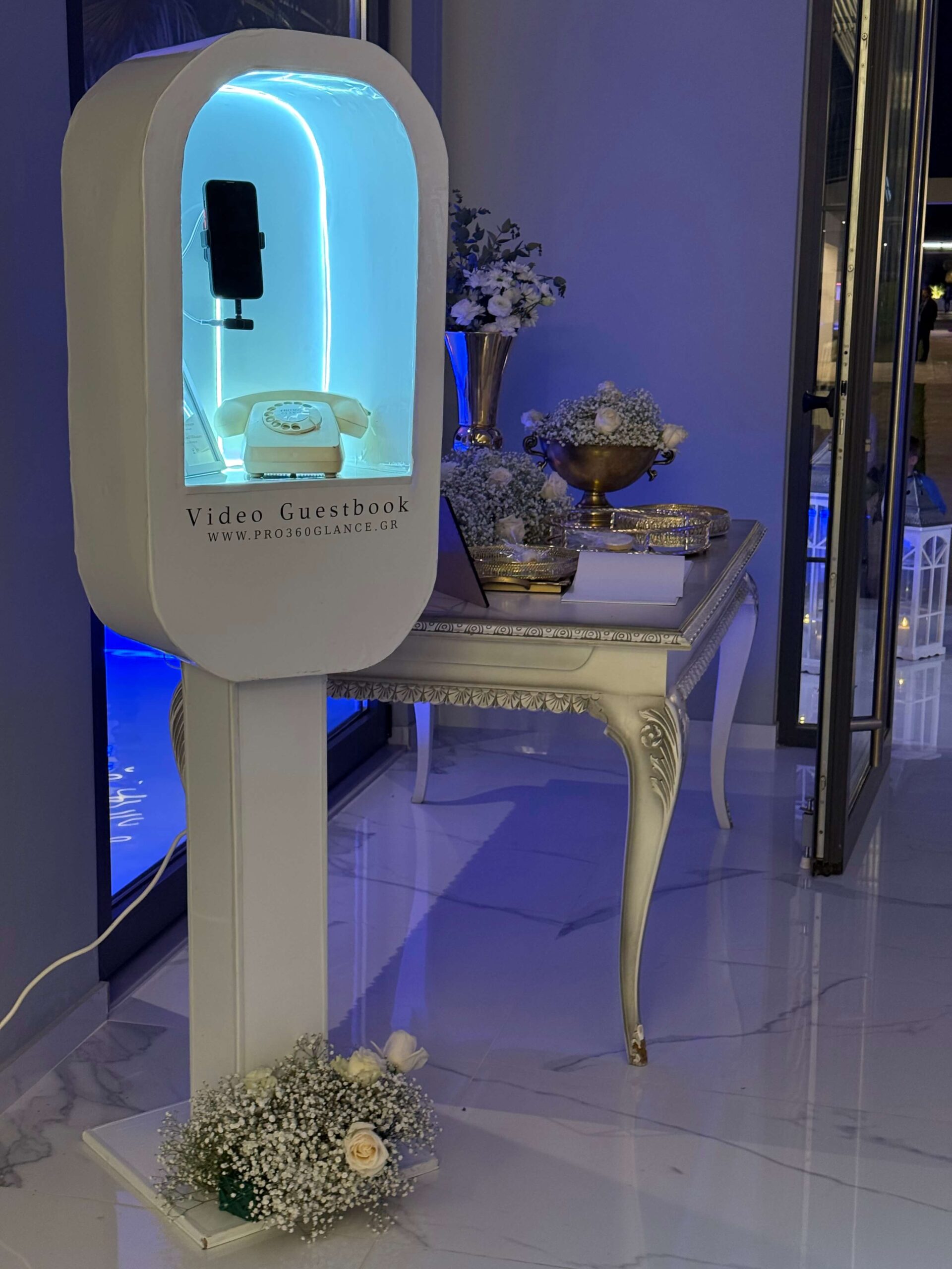 Video guest book telephone display at an elegant event setup