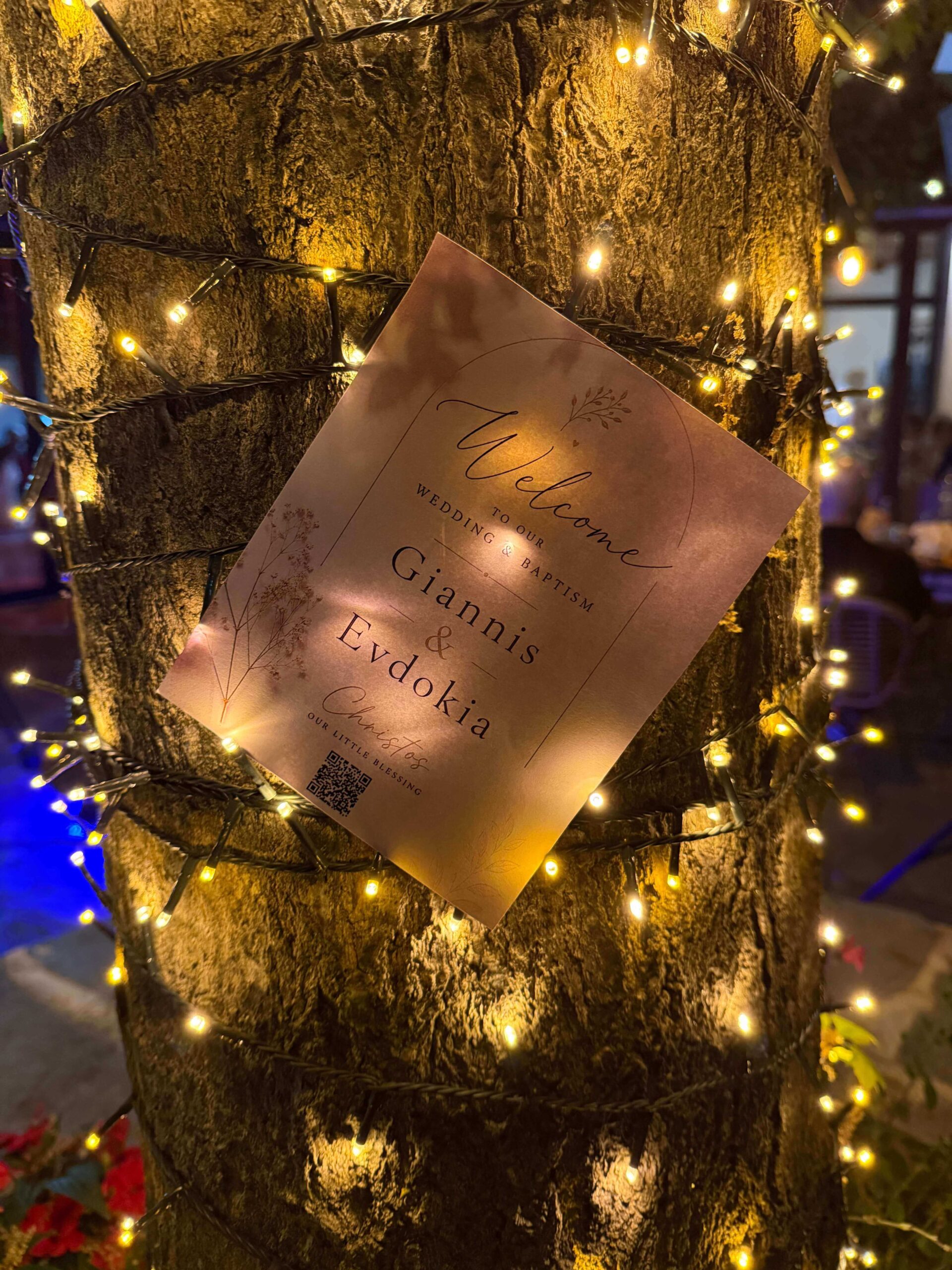Guest moments gallery card displayed among warm event lights